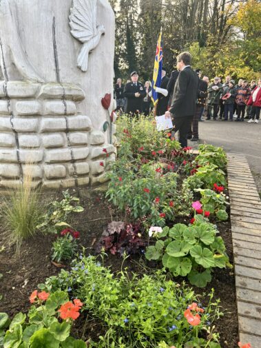 emembrance 2024 Chairman, flowers and flag