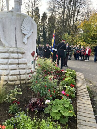 Remembrance 2024 Flowers, Flag, DL and Piper